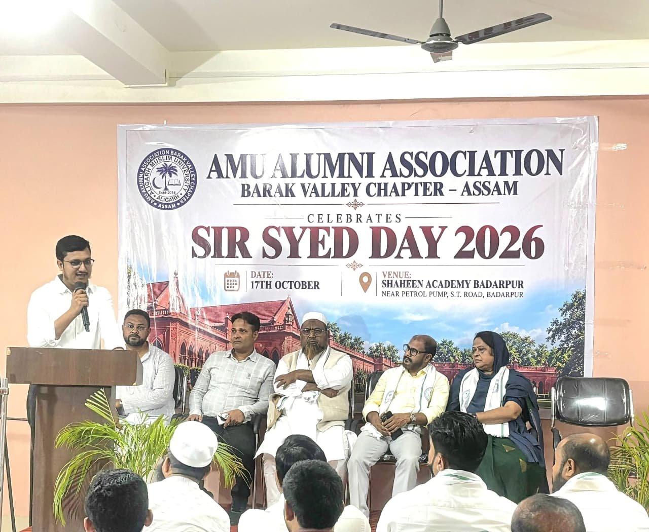 A speaker addressing the audience at Sir Syed Day 2026 at Shaheen Academy Badarpur